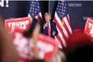  ?? Iowa. Photograph: Scott Morgan/Reuters ?? Donald Trump points at his supporters after speaking during the rally in Dubuque,