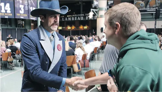  ?? JIM MATTHEWS/THE POST-CRESCENT VIA AP ?? Aaron Rodgers was at the Green Bay Chamber of Commerce Welcome Back Packers Luncheon Wednesday when details of his new deal broke.