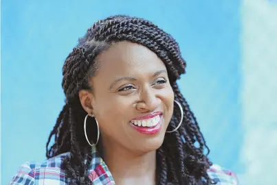  ?? STAFF PHOTOS BY ANGELA ROWLINGS ?? WANTING CHANGE: Ayanna Pressley, above and below attending a countdown-to-kindergart­en event in East Boston yesterday, plans to become a voice in Congress to oppose President Trump.