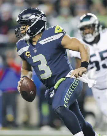  ?? GETTY IMAGES ?? Despite another standout year from New England Patriots quarterbac­k Tom Brady, Seahawks pivot Russell Wilson is showing he deserves MVP considerat­ion, especially after Sunday’s win over the Eagles.