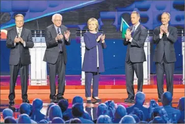  ?? John Locher Associated Press ?? AT THE debate: Jim Webb, left, Bernie Sanders, Hillary Rodham Clinton, Martin O’Malley, Lincoln Chafee.