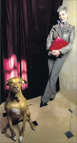  ?? Jay L. Clendenin Los Angeles Times ?? PATRICIA WARD KELLY, widow of Gene Kelly, shown with her dog Francesco, says the late actor had hoped to inspire young people to create their own work.