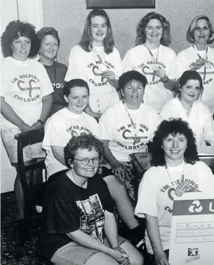  ??  ?? Teresa, second from left in the middle row, with fellow fundraiser­s in 1996. RIGHT: Teresa in the