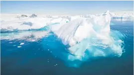  ?? ?? PRISTINE. An iceberg at the Gerlache Strait, which separates the Palmer Archipelag­o from the Antarctic Peninsula, in Antarctica.