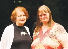  ?? Dan Haar / Hearst Connecticu­t Media ?? Jayne Turner, left, a client at Companions & Homemakers, and Heather Drake, her caregiver, at the agency’s office in Farmington, where they discussed a state law that would bar home care agencies from enforcing noncompete agreements.