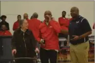  ?? MORNING JOURNAL FILE ?? George Abram, center front, lets out his trademark bellowing “three” at a special tribute to him at Oberlin High School’s basketball game against Lutheran West on Feb. 24, 2017. Abram, who was the voice of the school’s basketball team for 39 years,...