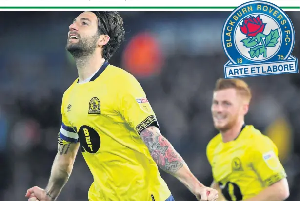  ??  ?? Blackburn’s Charlie Mulgrew celebrates after scoring the opening goal from the penalty spot against Swansea