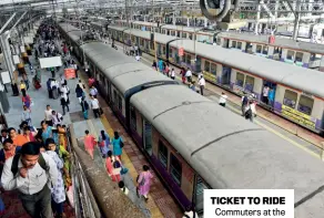  ??  ?? TICKET TO RIDE Commuters at the Chhatrapat­i Shivaji Terminus, Mumbai