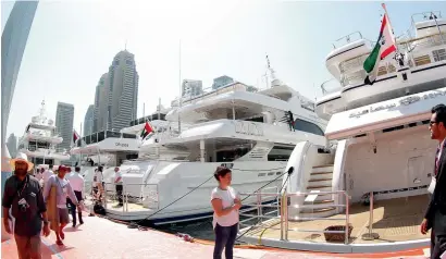  ?? Photo by Juidin Bernarrd ?? Visitors at the 25th edition of Dubai Internatio­nal Boat Show at Dubai Internatio­nal Marine Club on Tuesday. —