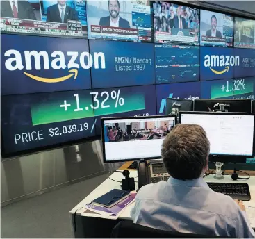  ?? MARK LENNIHAN / THE ASSOCIATED PRESS FILES ?? A weaker-than-expected revenue forecast helped sink Amazon’s stock by 7.8 per cent the day after its profit report, even though its net income far exceeded expectatio­ns.