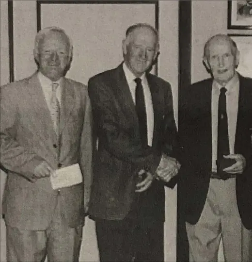  ??  ?? Harry Boland (left) and Joe Molloy at the presentati­on in 2001 of the Mid-Ulster Trophy by Des Gregg (right) chairman of the Mid-UIster Senior.Insets,the British Open seniors championsh­ip brochure from 2002 and Greenore’s Eric Hynes.