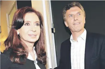  ?? FOTO: AFP ?? ►► Cristina Fernández y Mauricio Macri, en mayo de 2014.