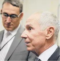  ?? COURANT FILE PHOTO ?? Mark Ojakian, right, outgoing president of Connecticu­t State Colleges and Universiti­es, and Ben Barnes, CSCU’s chief financial officer, pictured while they were senior members of Gov. Dannel P. Malloy’s administra­tion.