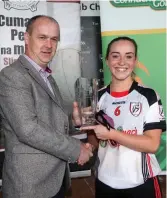  ??  ?? Sadbh Brennan of St Mary’s receives the Player of the Match award from President of the Connacht LGFA, Liam McDonagh from St Nathy’s.