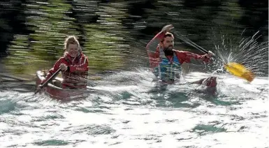  ??  ?? Ulli Mattsson and Adam Weymouth battle the wet and wild Yukon River in Alaska.