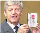  ?? Head of Showbiz ?? HONOUR Star with MBE medal in 1999