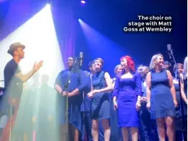  ??  ?? The choir on stage with Matt Goss at Wembley