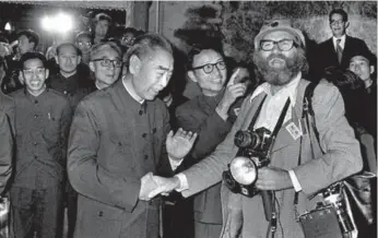  ?? PETER BREGG/THE CANADIAN PRESS FILE PHOTO ?? Chinese Premier Zhou Enlai greets Innell in Luoyang in October 1973, during former prime minister Pierre Trudeau’s trip to China. Zhou told Innell that he resembled Karl Marx, much to the photograph­er’s amusement.