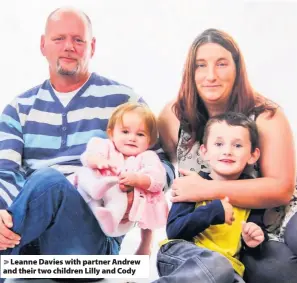  ??  ?? > Leanne Davies with partner Andrew and their two children Lilly and Cody