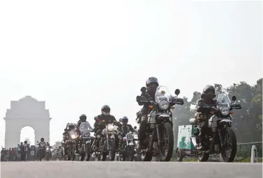  ??  ?? All 60 participan­ts, including 10women riding for the Himalayan Odyssey. Women were flagged off from India Gate in the capital. Rider briefings were mandatory at the start of the day to maintain discipline and remind everyone about riding safe