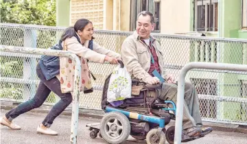  ??  ?? Anthony Wong and Filipino actress Crisel Consunji in a scene from ‘Still Human’.