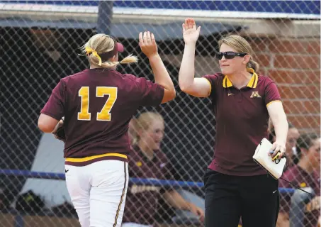  ?? Rick Scuteri / Associated Press 2015 ?? Jessica Allister (right) led Minnesota to a 56-5 record and the first national No. 1 ranking in school history this past season.