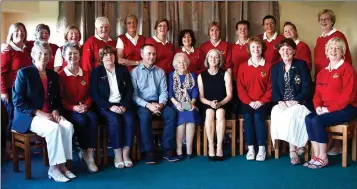  ??  ?? The Edenderry team with Peggy Finn and officials of Courtown Golf Club after their victory in the recent Finn Trophy final which was inaugurate­d in 1966.
