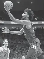  ?? JAIME VALDEZ/USA TODAY SPORTS ?? Marvin Bagley III scored a game-high 30 points for Duke in winning the PK80 Invitation­al Motion bracket Sunday with an 87-84 comeback victory against Florida in Portland, Ore.