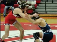  ?? ?? Chippewa Valley wrestled Dakota in a Division 1district championsh­ip match Wednesday.