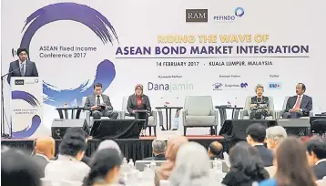  ??  ?? Ranjit delivers his speech at the Asean Fixed Income Conference 2017: Riding the Wave of Asean Bond Market Integratio­n yesterday. — Bernama photo