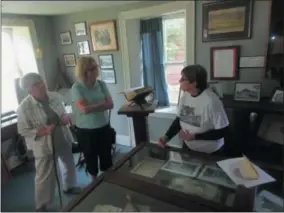  ?? FILE PHOTO SPECIAL TO THE DISPATCH BY MIKE JAQUAYS ?? Back Street Mary Messere, right, shares her historical knowledge with Pody Vanderwall, left, and Patricia Hoffman at the Old Town of Eaton Museum in May 2016.