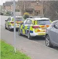  ??  ?? Police cars parked in Bowens Field on Monday