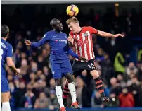  ?? AFP ?? Chelsea’s French midfielder N’Golo Kante (left) vies with Southampto­n’s James Ward-Prowse on Wednesday. —