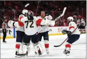  ?? PATRICK SMITH — GETTY IMAGES/TNS ?? Panthers goaltender Sergei Bobrovsky (72) celebrates with teammates after the series-clinching overtime goal.