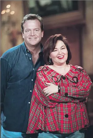  ?? Associated Press ?? ROSEANNE AND Tom Arnold had a volatile relationsh­ip with each other as well as with ABC.