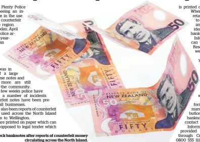  ??  ?? Check banknotes after reports of counterfei­t money circulatin­g across the North Island.