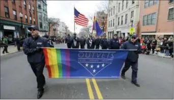  ?? STEVEN SENNE - THE ASSOCIATED PRESS ?? In this 2016 , photo, members of OutVets, a group of gay military veterans, march in the annual St. Patrick’s Day Parade in Boston’s South Boston neighborho­od. The group said March 8 it was denied permission to march in the 2017 Boston St. Patrick’s...