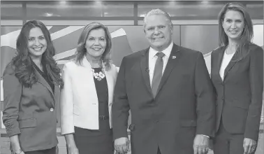  ?? THE CANADIAN PRESS ?? Ontario Conservati­ve party leadership candidates Tanya Granic Allen, left to right, Christine Elliott, Doug Ford and Caroline Mulroney pose for a photo in Toronto on Thursday following a televised debate.