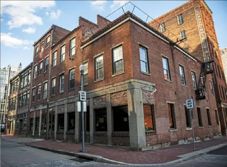  ?? Michael M. Santiago/Post-Gazette ?? The building that houses the former Froggy's tavern, Tuesday, March 19, 2019, on Market Street in Downtown.