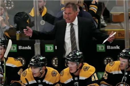  ?? STuART cAHILL PHoTos / HeRALd sTAFF FILe ?? ‘PUT OUT SOME FIRES’: Bruins head coach Bruce Cassidy was pleased his fourth line, which struggled in the preseason, did not allow a goal in Saturday’s season-opening win over Dallas on Saturday. Meanwhile, a connection between Jake DeBrusk, top, and Nick Foligno is emerging.