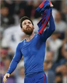  ?? DAVID RAMOS, GETTY IMAGES ?? Lionel Messi celebrates after scoring FC Barcelona’s third goal during the La Liga match against Real Madrid CF on Sunday.