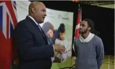  ?? JIM RANKIN/TORONTO STAR FILE PHOTO ?? Children and Youth Services Minister Michael Coteau, left, released a long-awaited blueprint on the provincial foster-care system Wednesday.