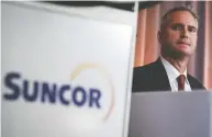 ?? JEFF MCINTOSH / THE CANADIAN PRESS FILES ?? Suncor president and CEO Mark Little says the restructur­ing should occur across the company.