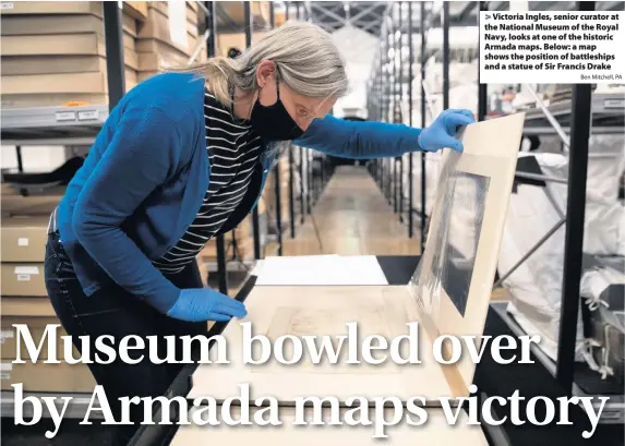  ?? Ben Mitchell, PA ?? Victoria Ingles, senior curator at the National Museum of the Royal Navy, looks at one of the historic Armada maps. Below: a map shows the position of battleship­s and a statue of Sir Francis Drake