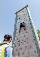  ??  ?? The climbing wall was popular.