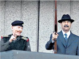  ??  ?? Al-douri in 2000 with Saddam Hussein, after whose death he continued to defend the Ba’athist cause
