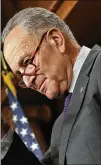  ?? WIN MCNAMEE / GETTY IMAGES ?? RIGHT: Senate Minority Leader Chuck Schumer, D-N.Y., asserts the GOP plan to lower taxes would benefit corporatio­ns and wealthy Americans while doing little to benefit lower-income and middle-class Americans.