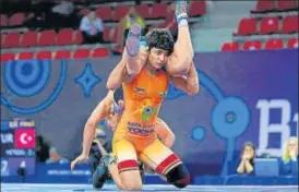  ?? HT PHOTO ?? Pooja Gehlot lost the U-23 World Championsh­ips 53-kg final in just 75 seconds.