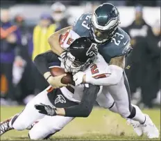  ??  ?? Rodney McLeod registers one of the Eagles’ three sacks of Atlanta quarterbac­k Matt Ryan Saturday in Philadelph­ia. The Eagles held Atlanta to 281 yards.