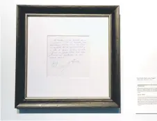  ?? — AFP photo ?? A napkin on which was written the first promise of a contract to secure 13year-old Lionel Messi for FC Barcelona, is on display at Bonhams, New York.